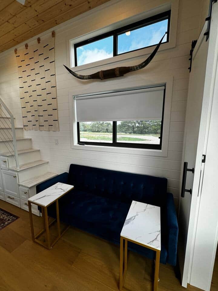 Texas glampgrounds blue moon tiny home living room loft stairs Texas glampgrounds blue moon tiny home living room loft stairs
