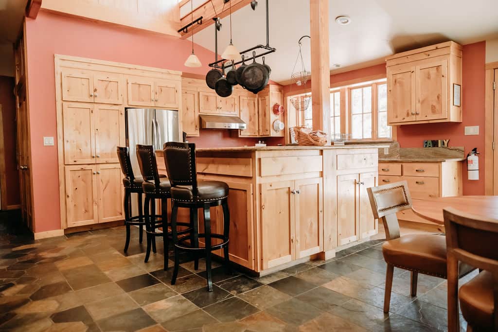 Counter seats keep the kitchen a gathering place.