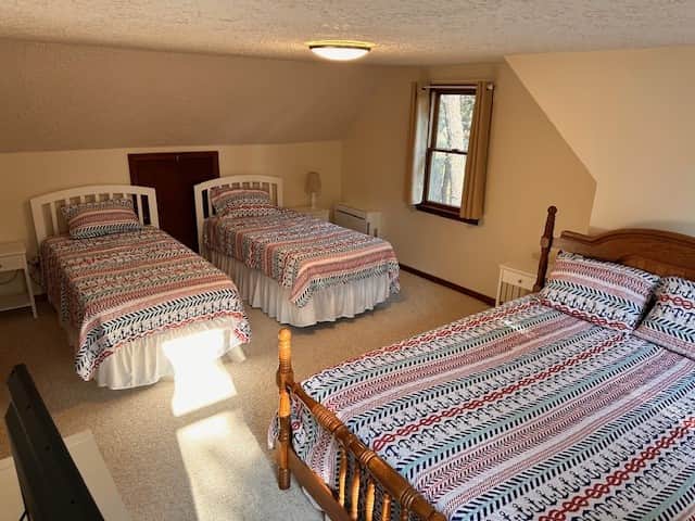 Upstairs bedroom 1 Queen and 2 Singles