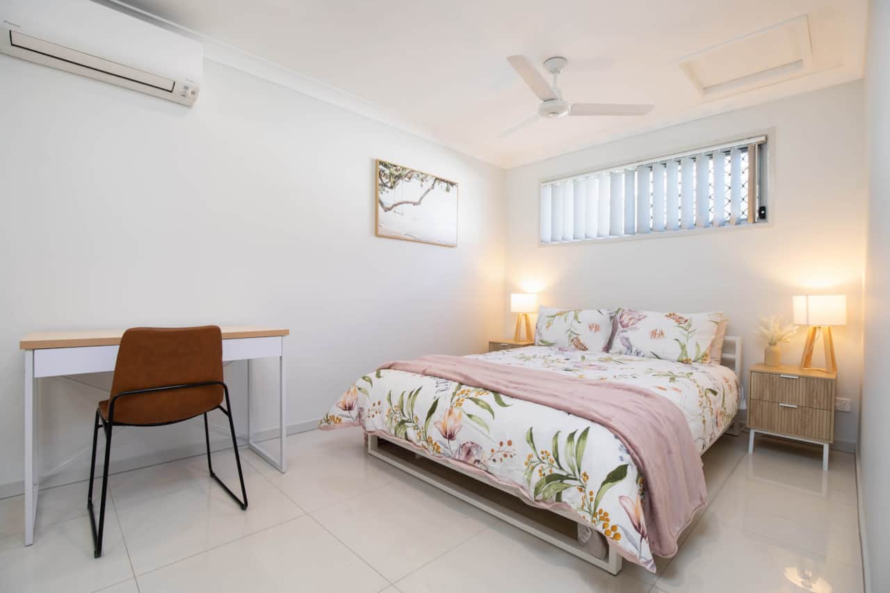 Bedroom: Peaceful bedroom with cozy design and ample storage 