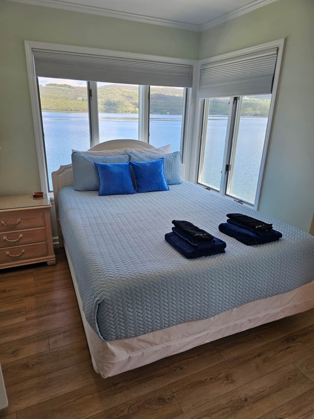 Main floor queen with attached full bath.  Towels provided.