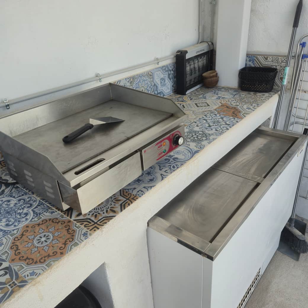 Plancha y cámara botellero