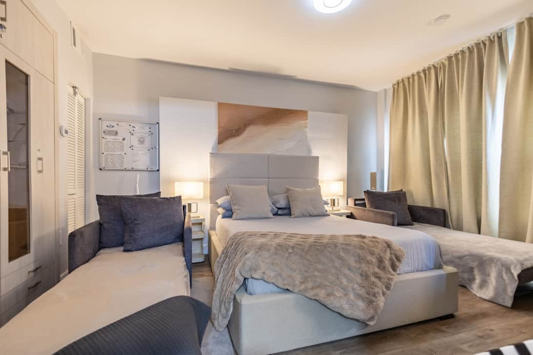 bedroom with sofa chair opened