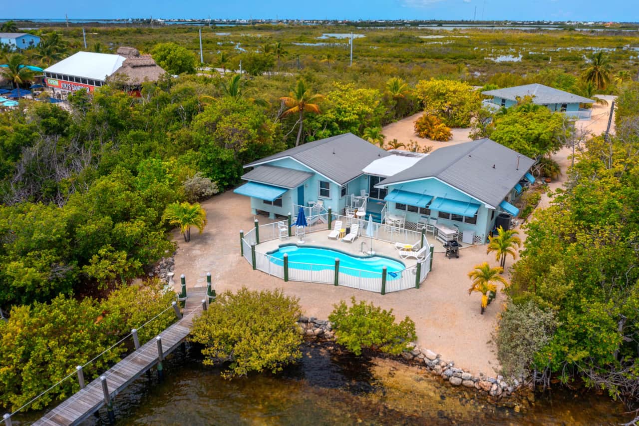 Barry Beach dock for fishing/snorkeling and pool for relaxing.