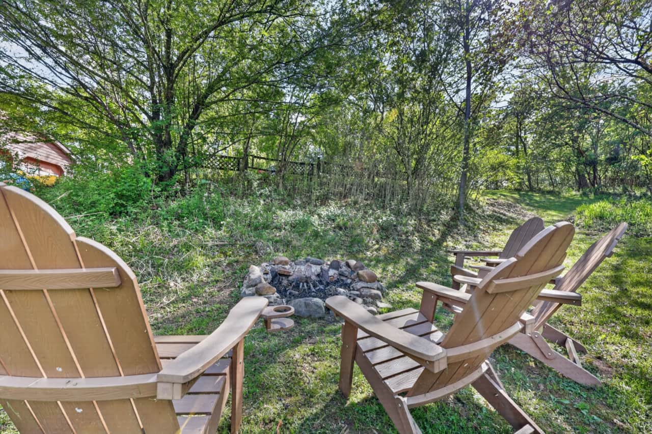 Fire pit with Adirondack chairs