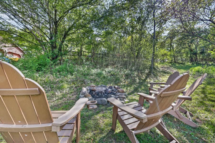 Fire pit with Adirondack chairs