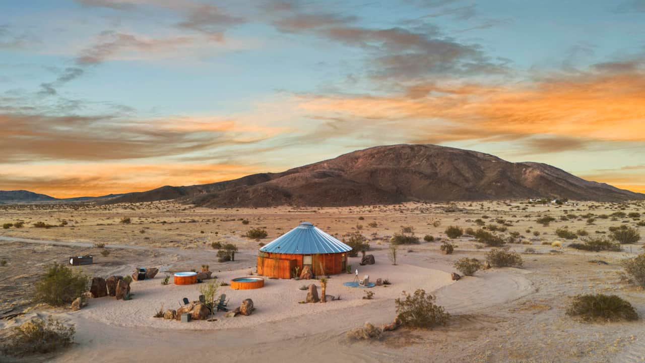 The arrival — your private Mojave kingdom at the end of a quiet desert road