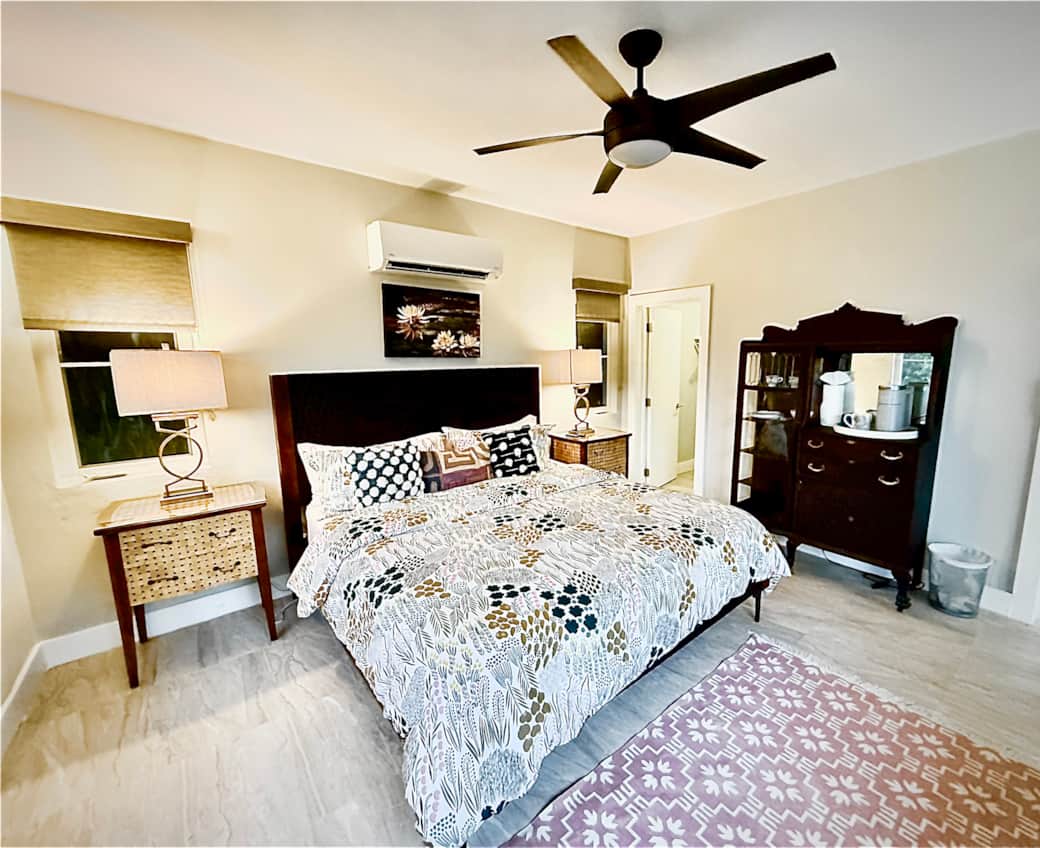 Suite with mini fridge, microwave, coffee makers, and limited kitchen supplies