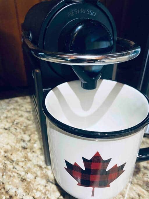 Enjoy a warm cup of coffee from the nespresso machine Enjoy a warm cup of coffee from the nespresso machine