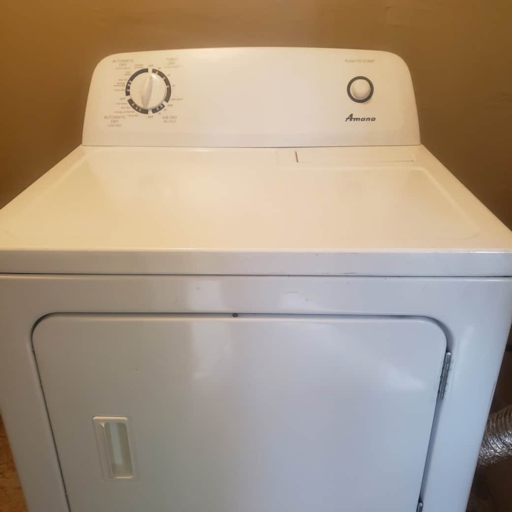 Dryer included in the storage room on the back porch