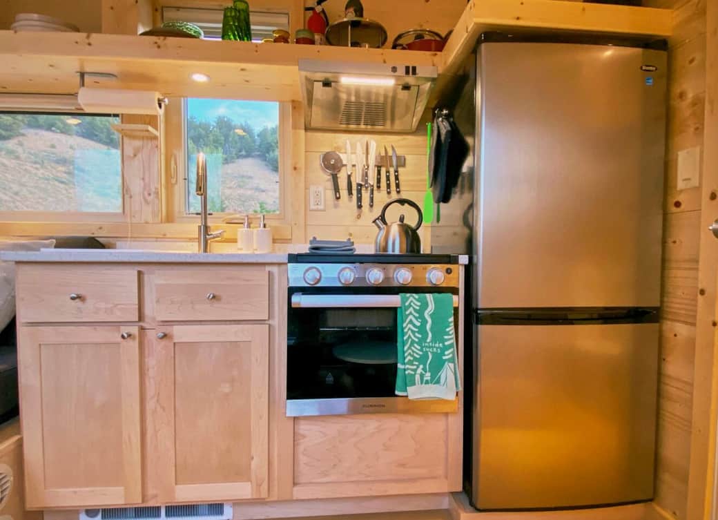 There is a full kitchen including a stove, oven, sink and full size refrigerator/freezer. Everything you may need to make a full meal. There is a full kitchen including a stove, oven, sink and full size refrigerator/freezer. Everything you may need to make a full meal.