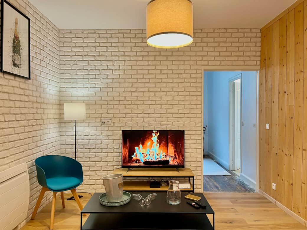 Le salon de l'appartement Arthys Logement à Reims par La Conciergerie Des Sacres