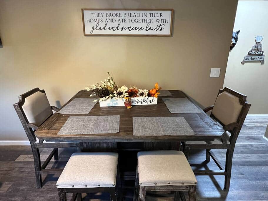 A large dining table big enough for everyone to share a great time and a meal together.