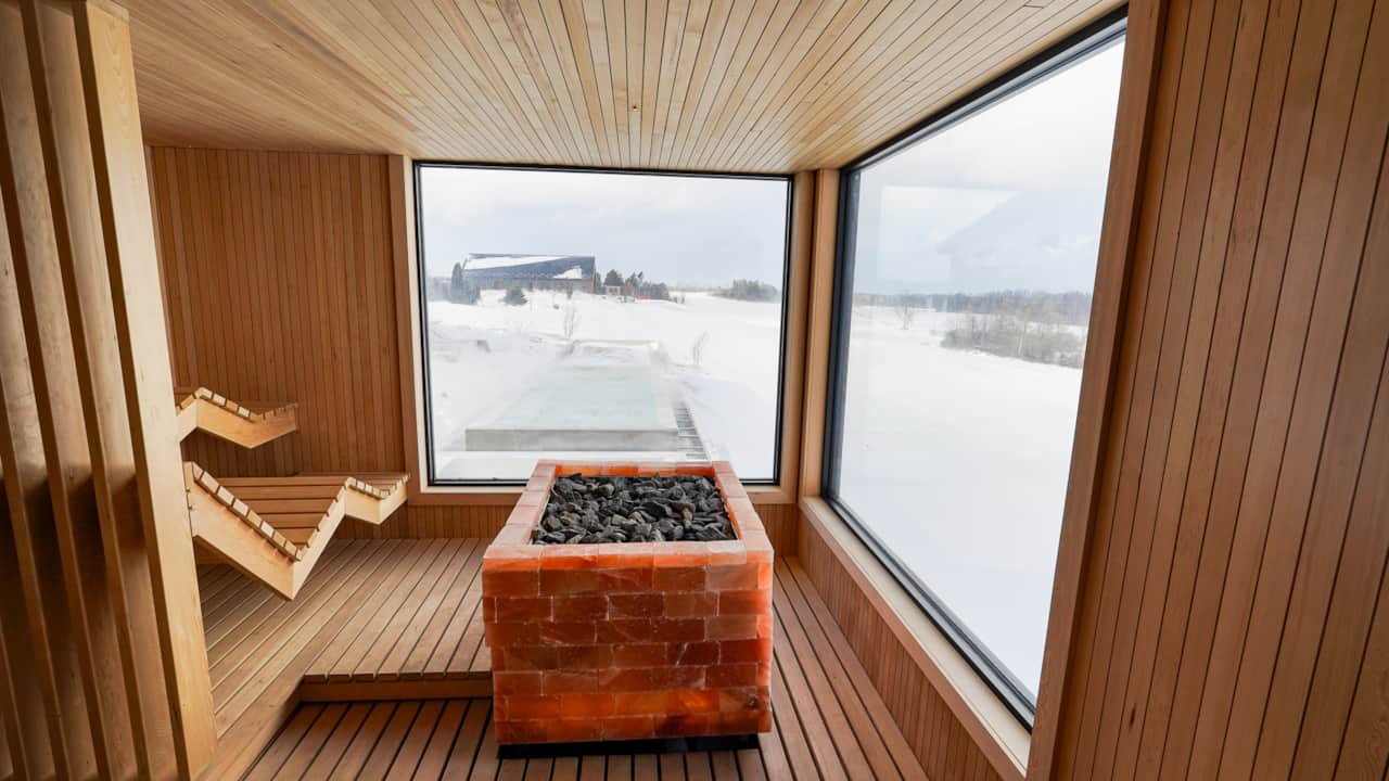 Sauna View of the Infinity-Edge Thermal Pool & Cold Plunge