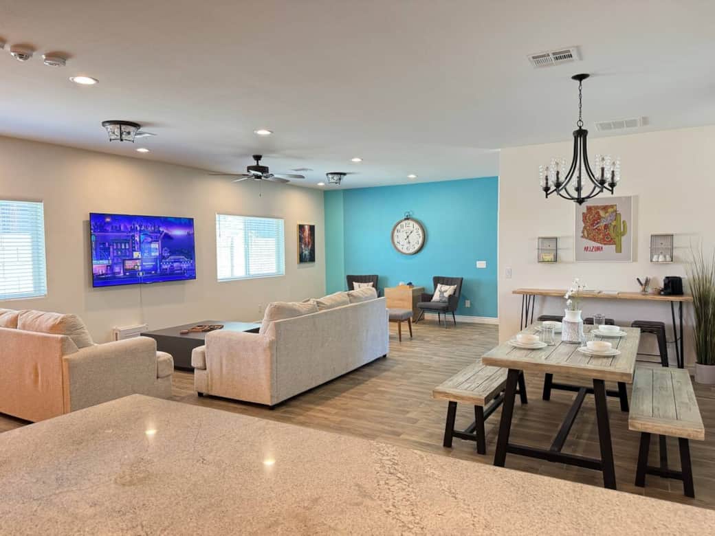 Dining fits 6 + 6 counter height stool seating on both sides of the dining table (Breakfast nook & Nespresso workstation).