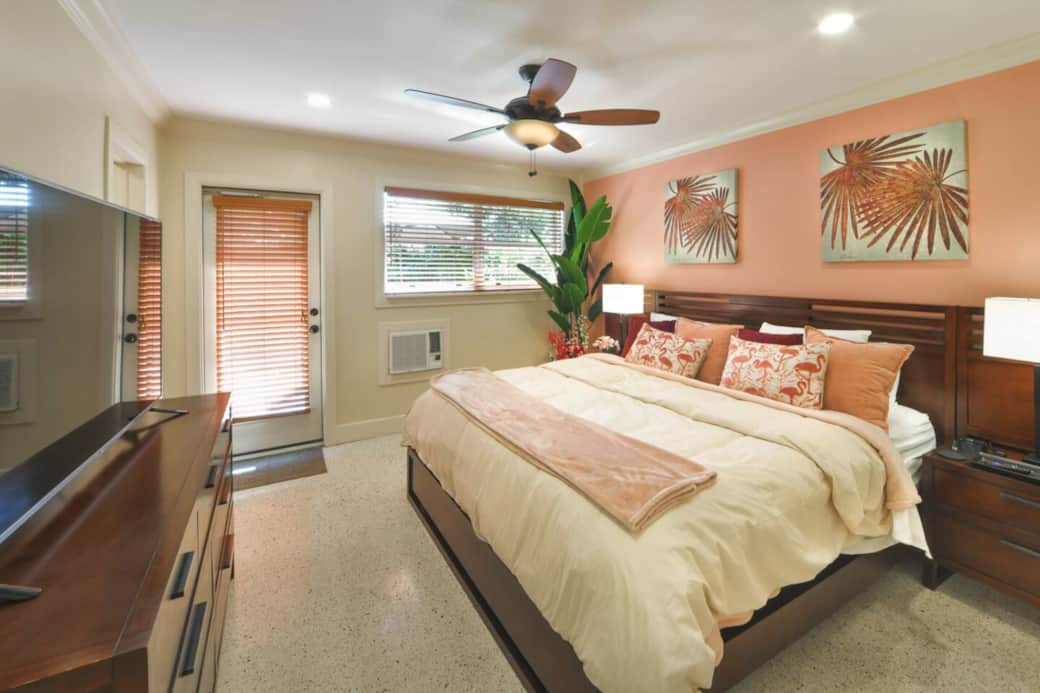 King Bed with TV and door to private terrace