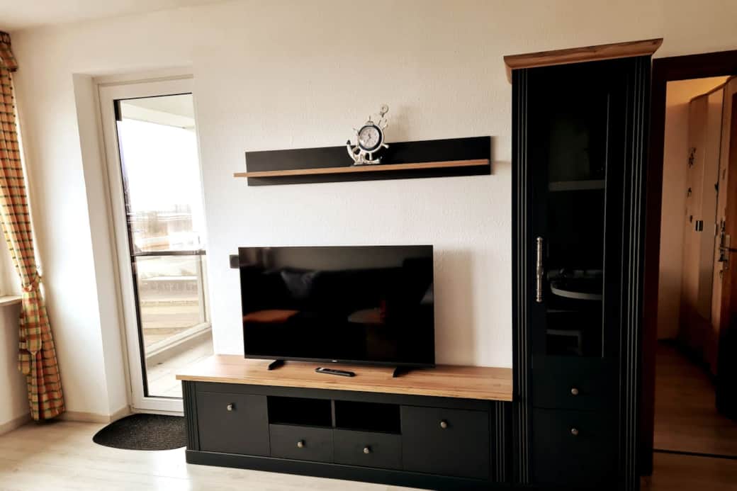 Sala de estar / Smart TV conectada a Wi-Fi