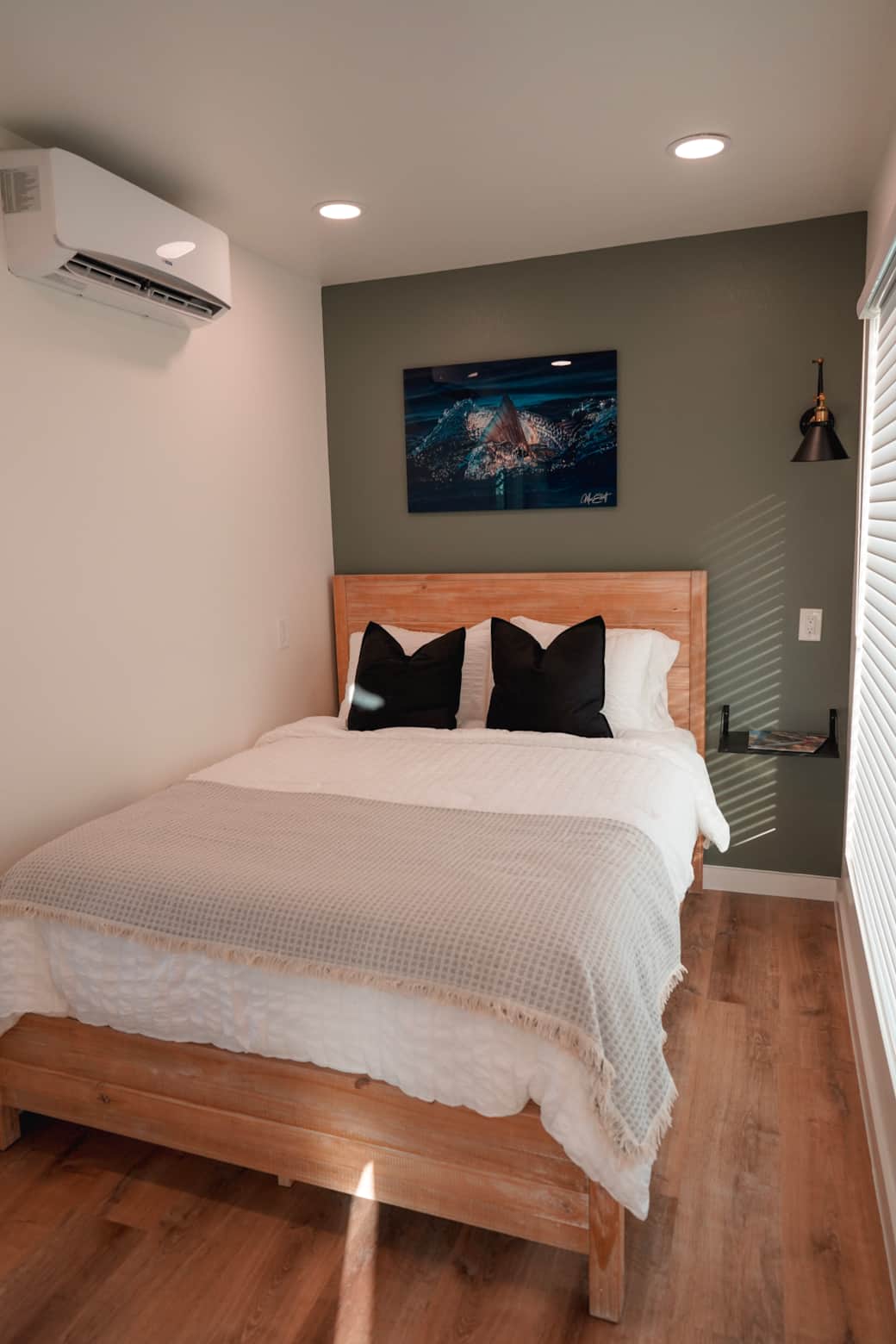 Bedroom: Queen bed with AC, TV, and outdoor view Bedroom: Queen bed with AC, TV, and outdoor view