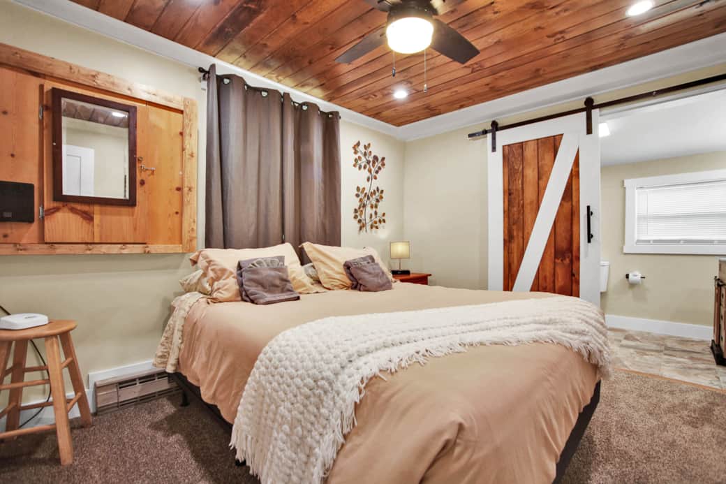 Bedroom 1- Queen bed, attached bathroom with walk in shower, hairdryer available
