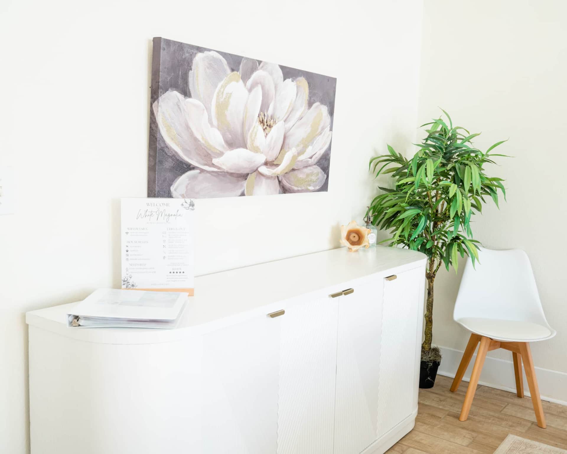 Entertaining console with wine storage and welcome guestbook.