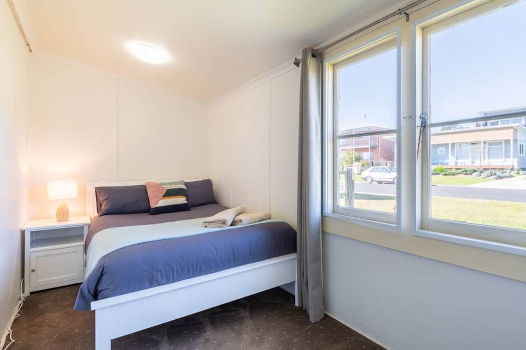 Front bedroom in house with double bed.