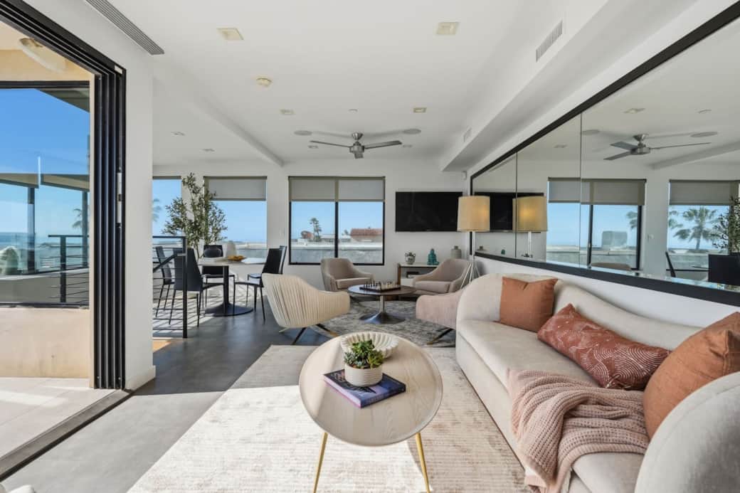 Located on the 3rd floor, this lounge features a TV, plush couch, and easy access to the balcony.