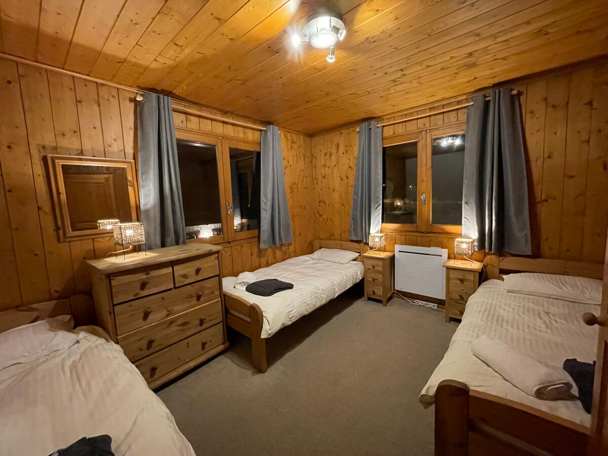 Chambre à trois lits simples