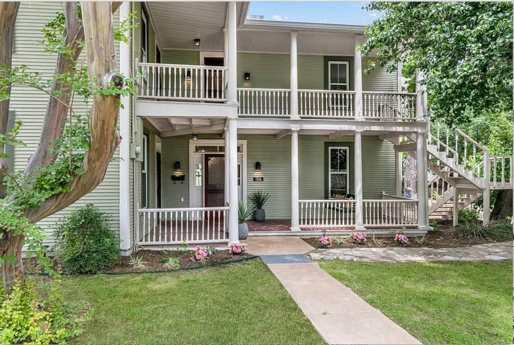 Stunning double balconies are just one of the signature features of this home