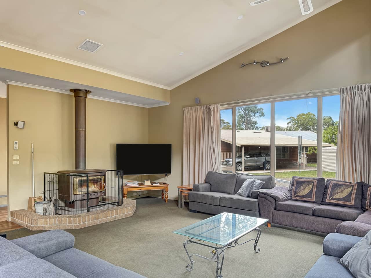 Massive living space with wood fire and large TV