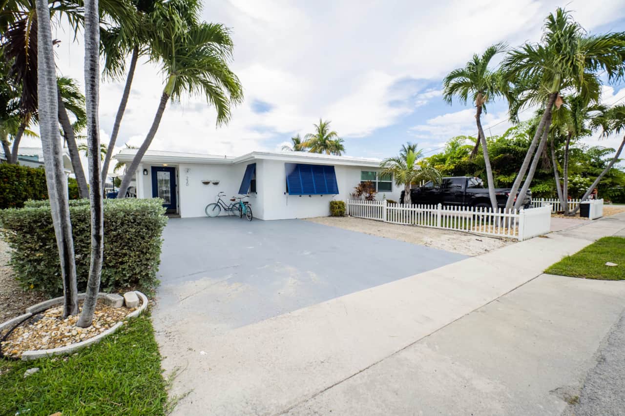 A 41-foot driveway with room for the truck and the boat trailer, both parked off the street.