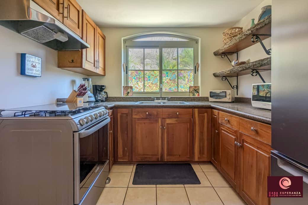 Well stocked kitchen area. Gas stove and oven, refrigerator, microwave, toaster oven, drip coffee