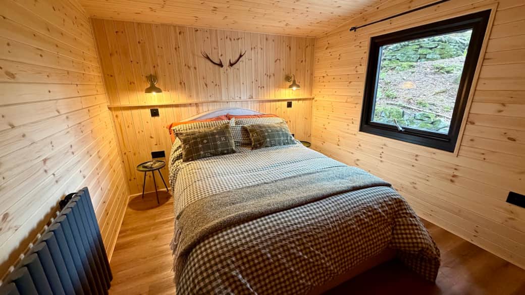 The main double bedroom with woodland view. 