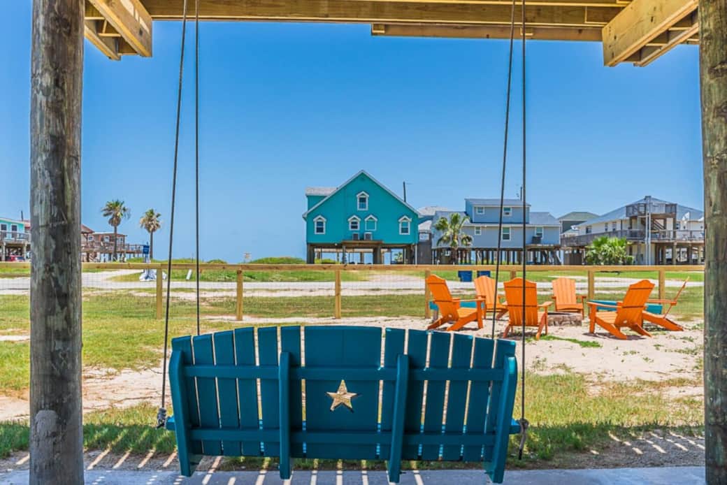 Enjoy the breeze from this shaded swing!