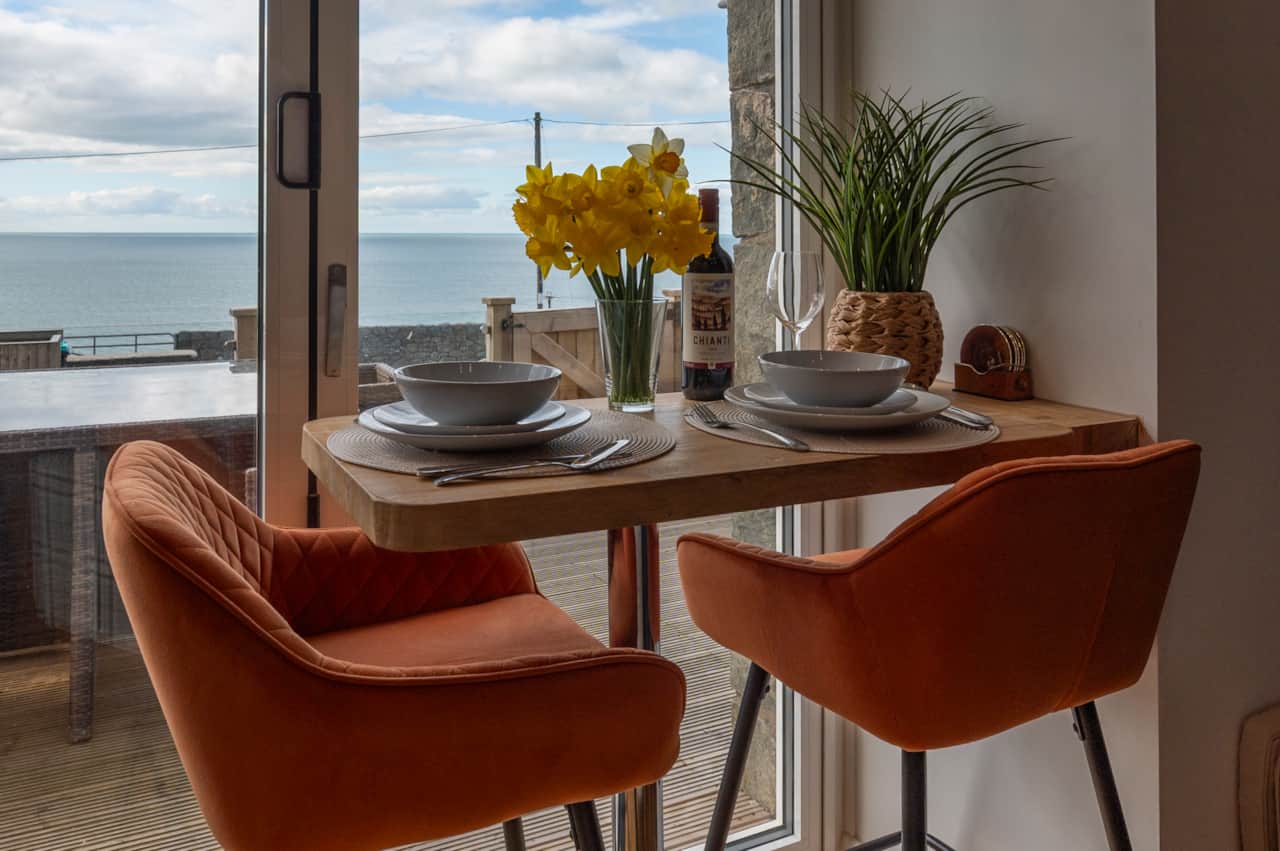 Intimate coastal dining setting