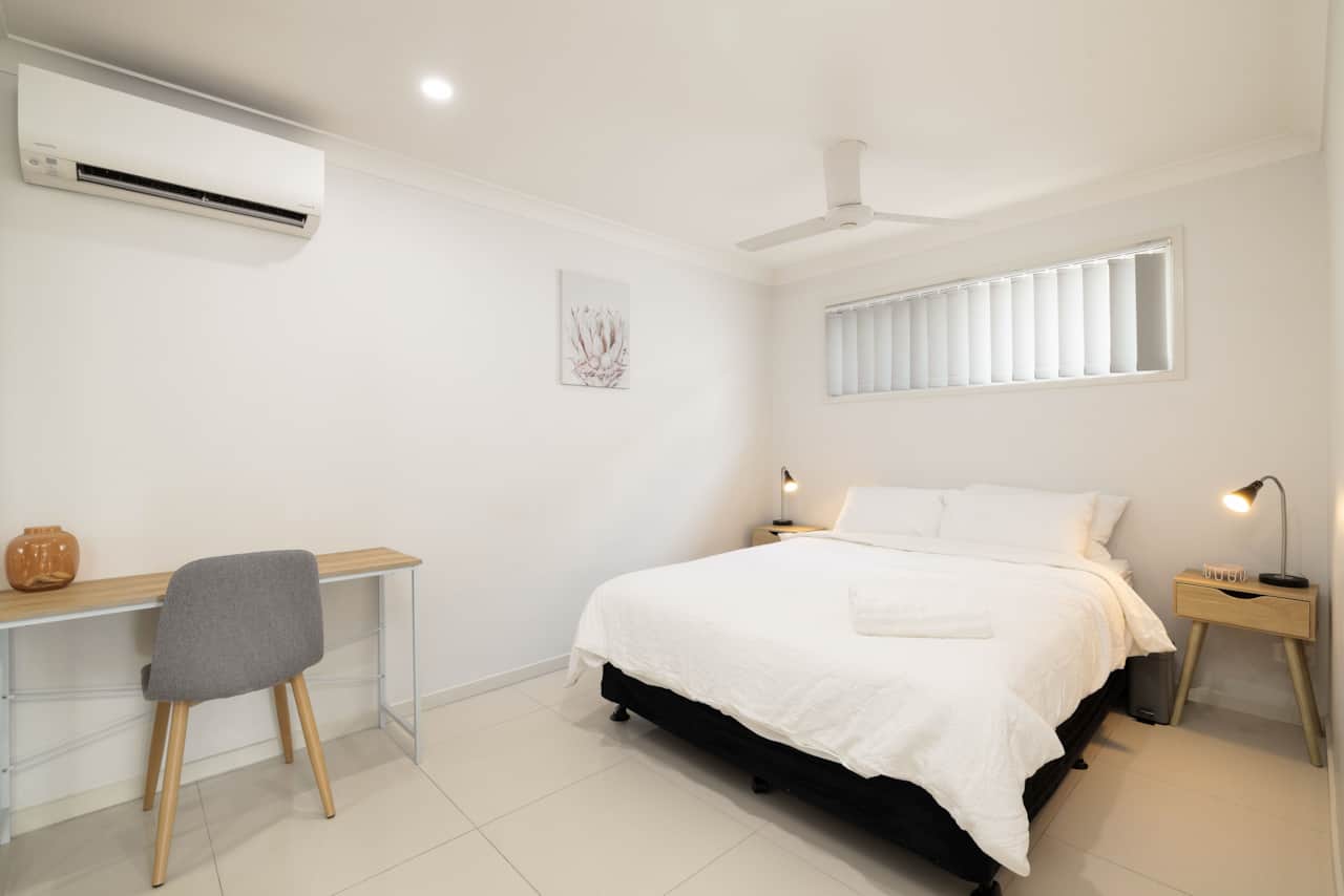 Bedroom: Peaceful bedroom with cozy design and ample storage 