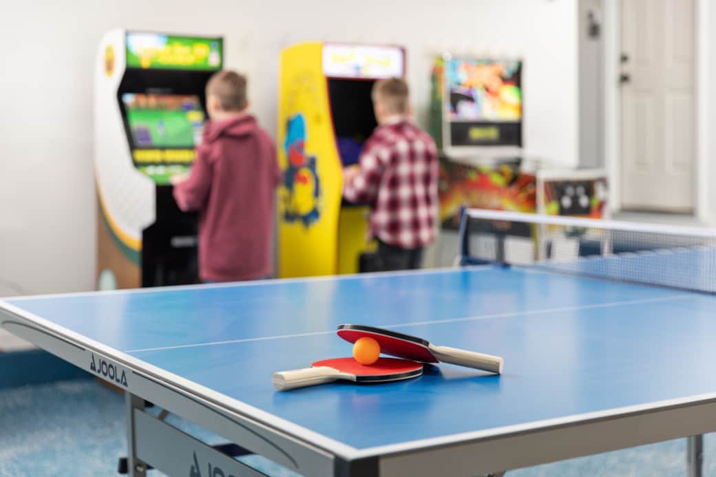 Fun-filled game room with ping pong, Pac-Man, and Golden Tee for hours of entertainment! Fun-filled game room with ping pong, Pac-Man, and Golden Tee for hours of entertainment!