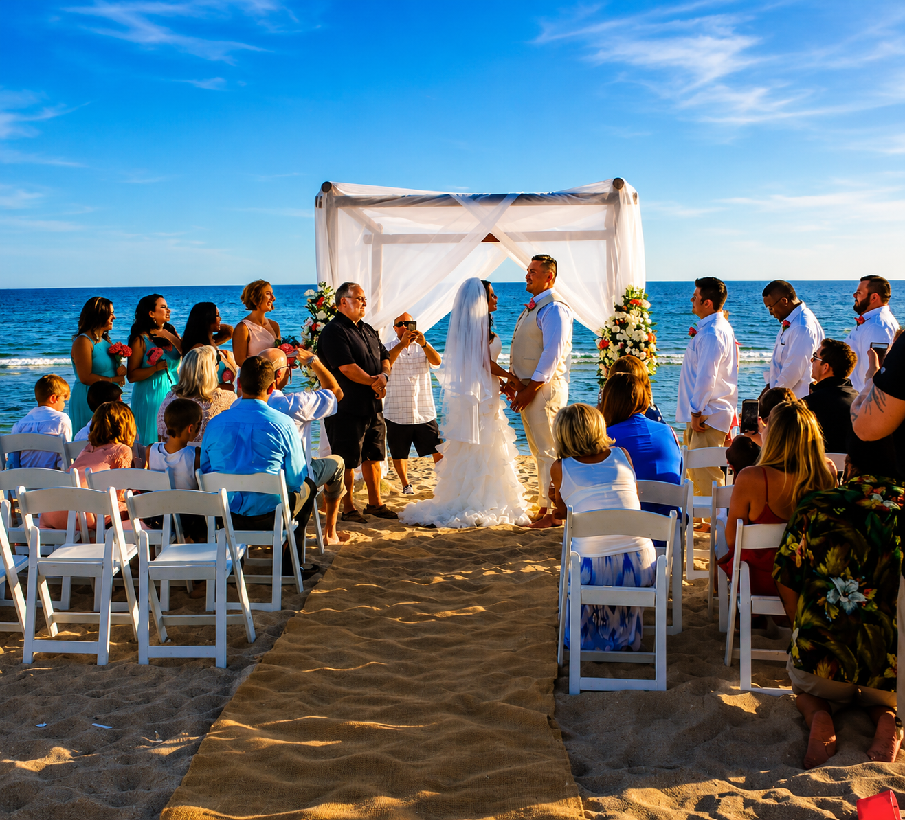 Beach wedding ceremony at Bella Sirena Resort
