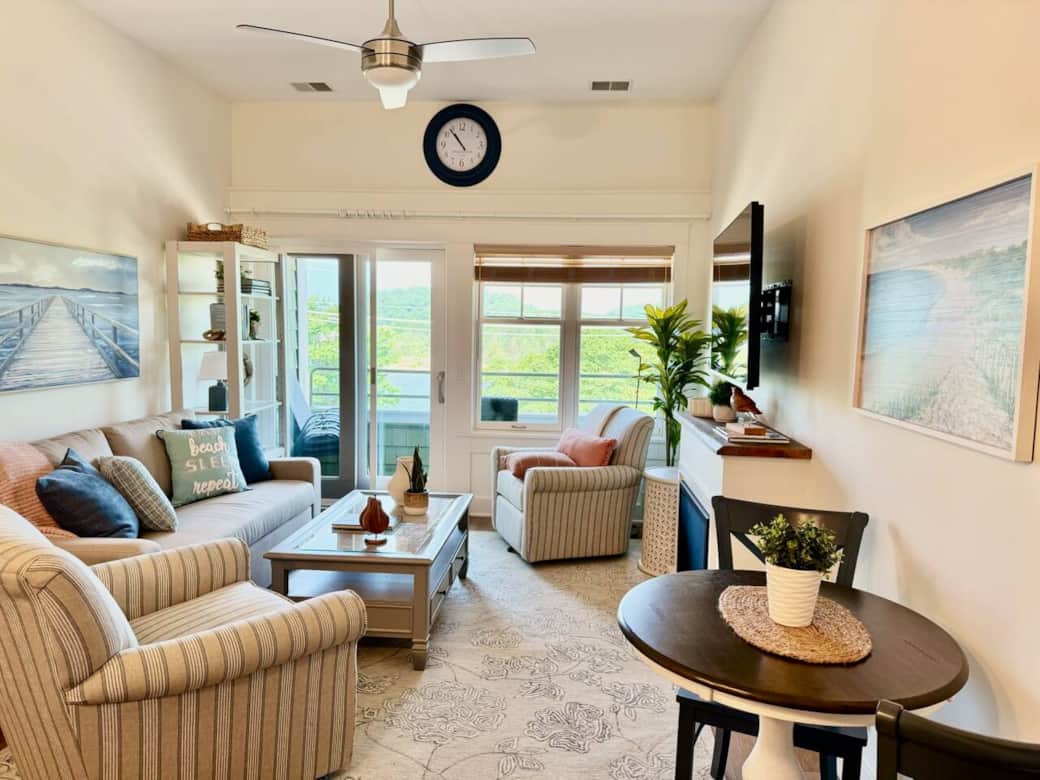 Coastal style living area with a comfy sofa sleeper, swivel chairs for channel views.