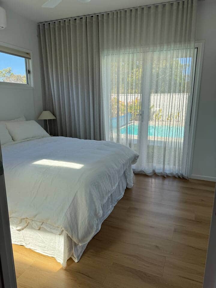 Master Bedroom w/king bed, AC, BIR, alfresco access, privacy lock & ensuite 