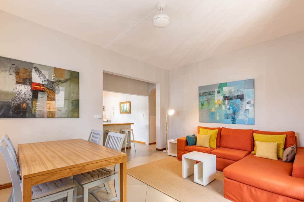 Living Room overlooking Kitchen and entrance