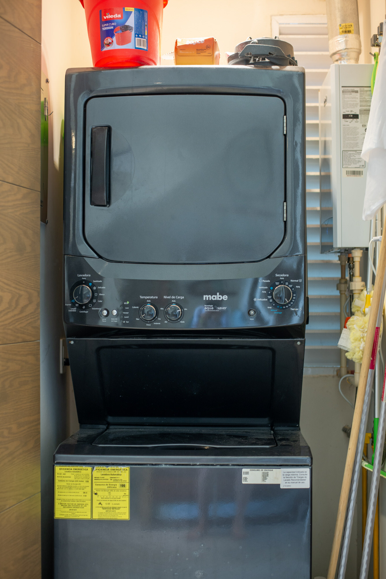 In-unit washer and dryer come with free detergent and cleaning supplies for a fresh and tidy stay.