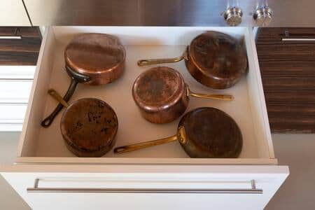Traditional copper cookware available for guests