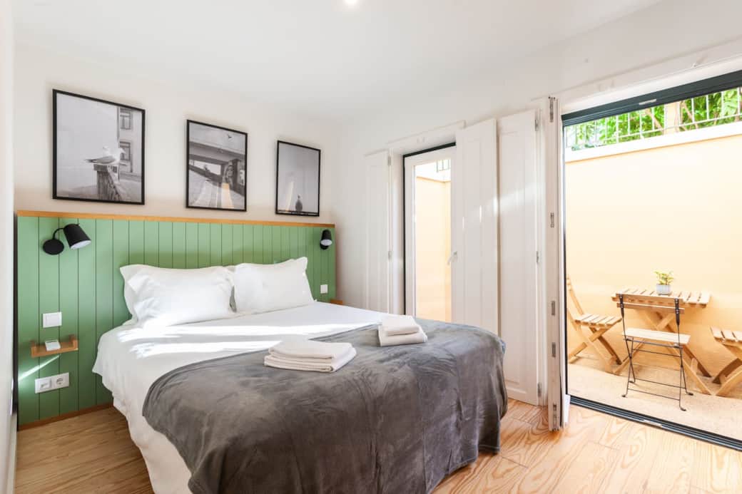 Bedroom with double doors to outside patio