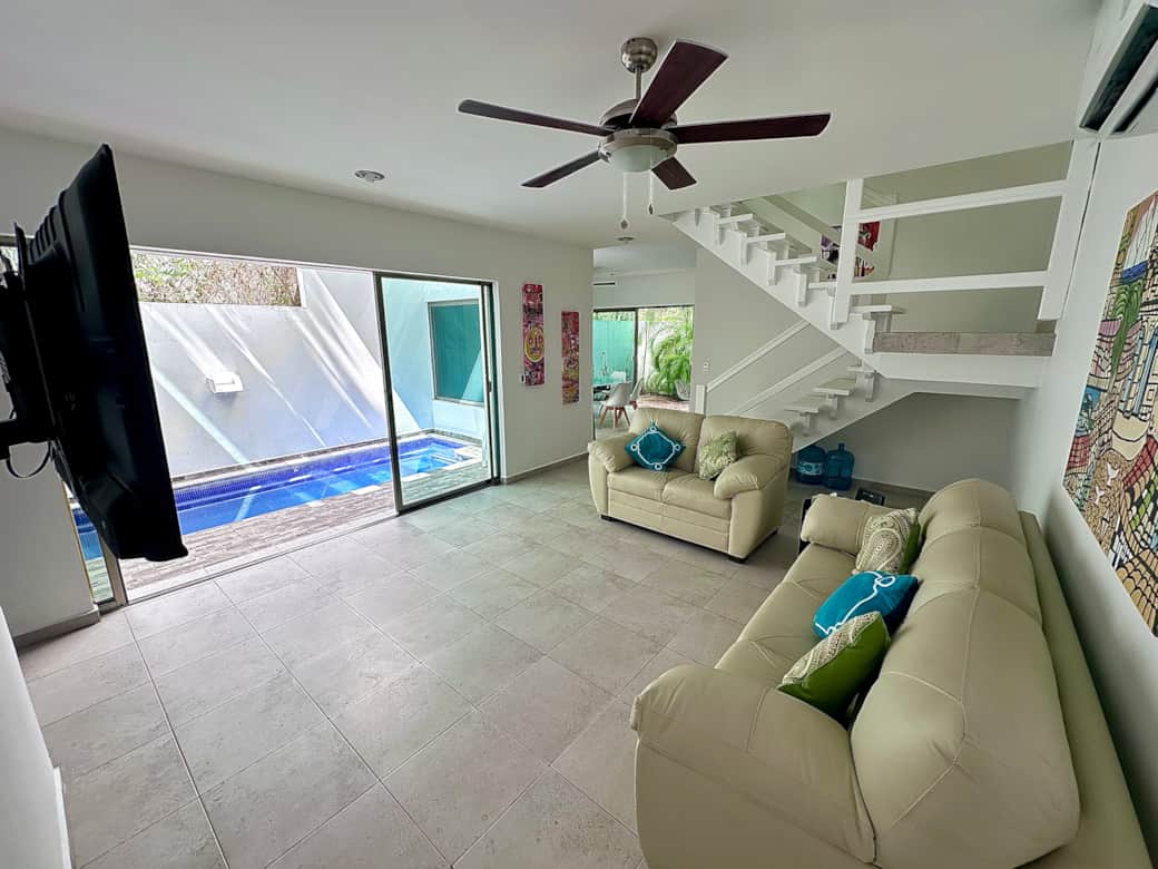 Well lit living room with Smart TV