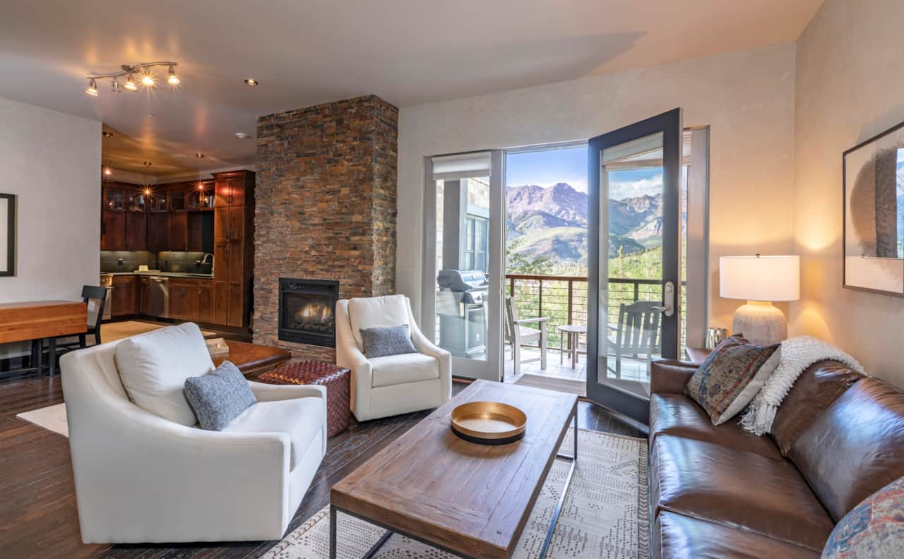 Living room summer views - unobstructed mountain views of the San Sophia ridgeline