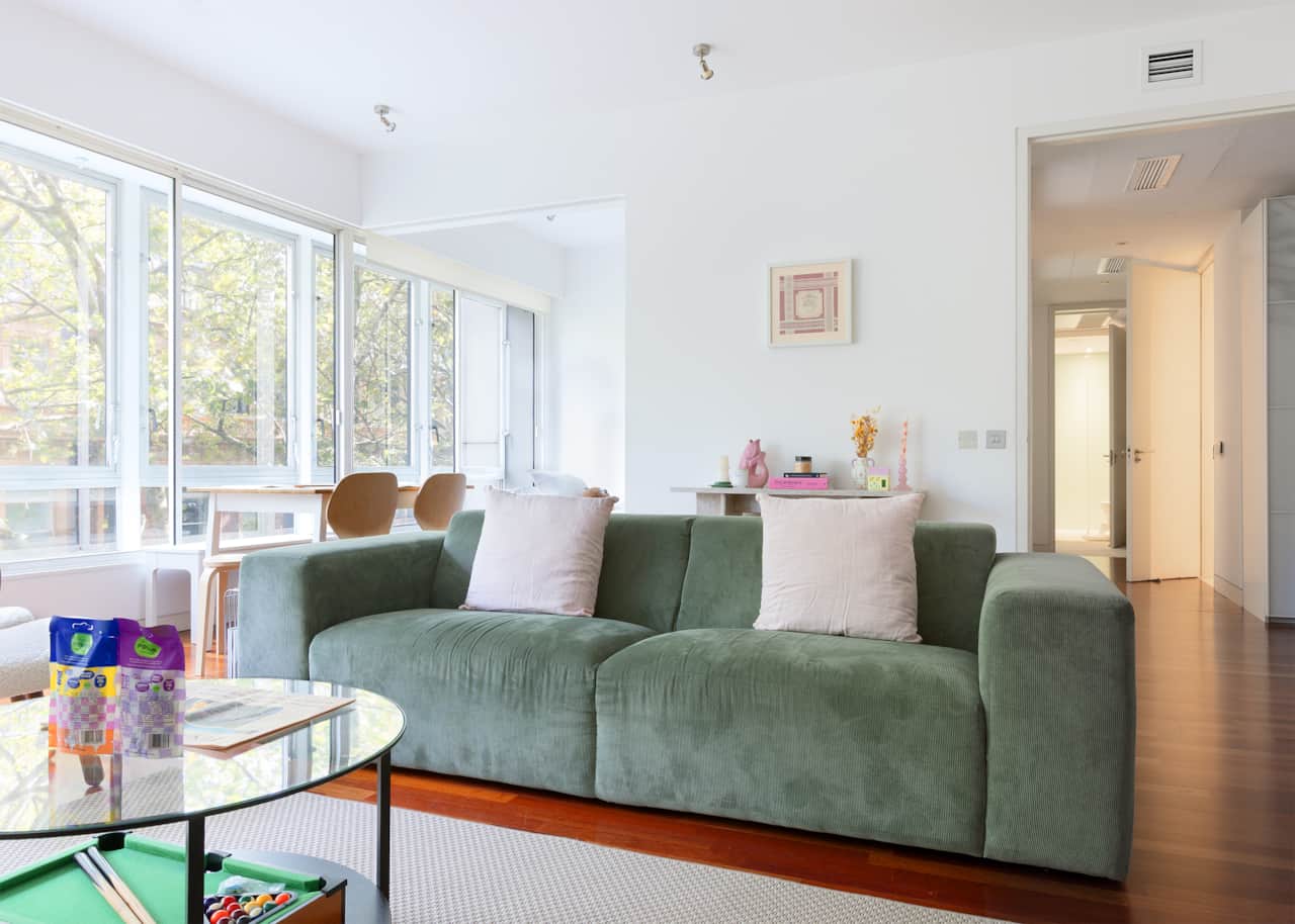 Comfortable sofa in bright West End apartment