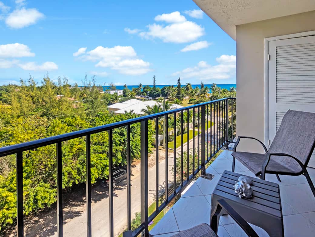 Private balcony with 2 chairs and table