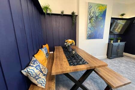 Spacious living area featuring original artworks