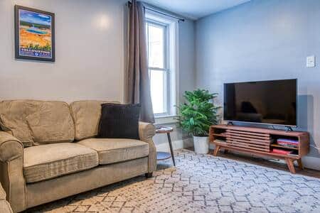 Relax at the end of the day on two comfortable love seats and use the 46" smart TV.
