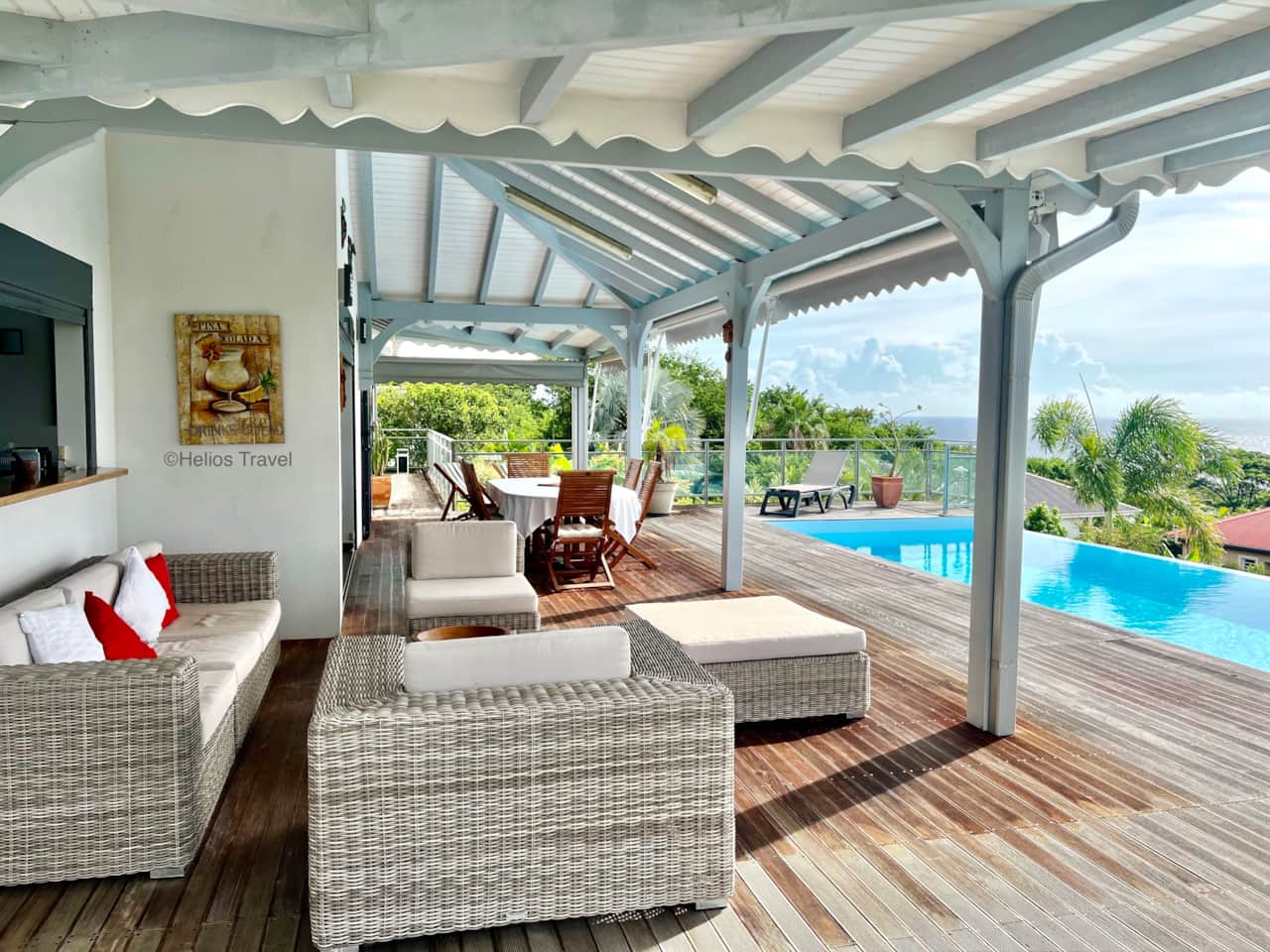 The outdoor living room and the infinity pool